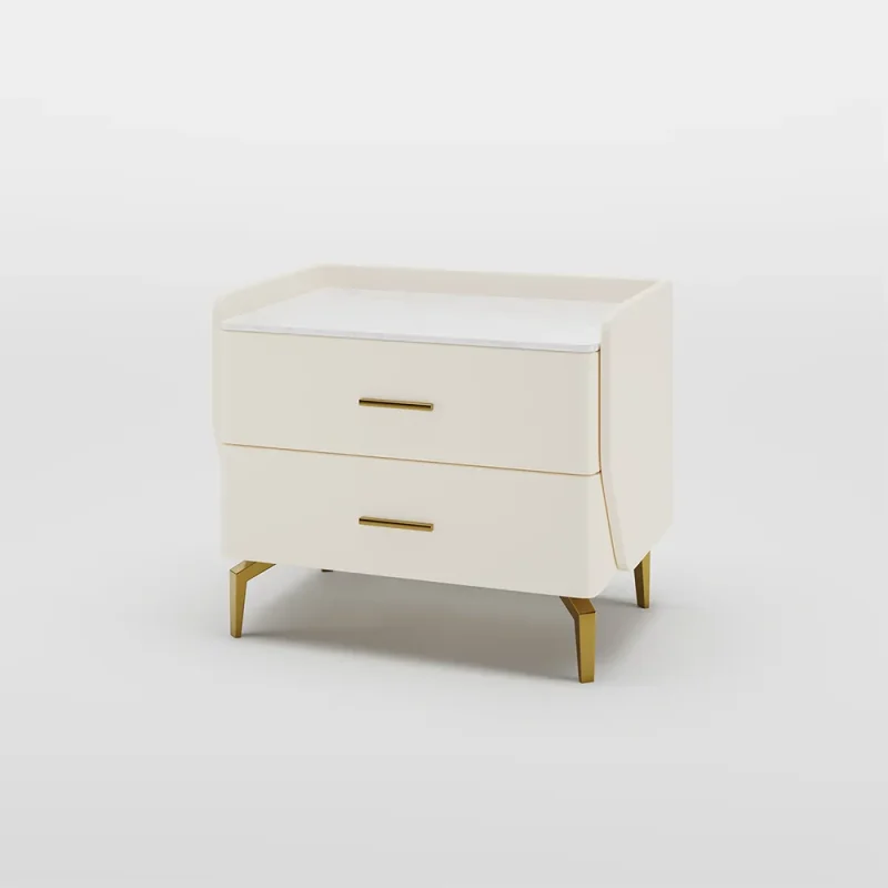 Cream-colored modern dresser with gold handles and angled legs, featuring two drawers and a recessed top surface suitable for use as a changing table.