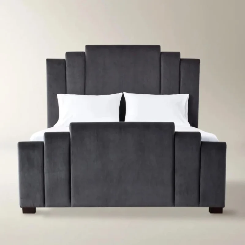 Monarq Bed with geometric panel headboard and dark gray upholstery for modern bedroom interiors