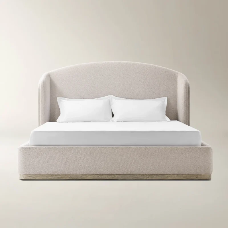 Cocoon Curve Bed with curved upholstered headboard for modern bedroom interiors