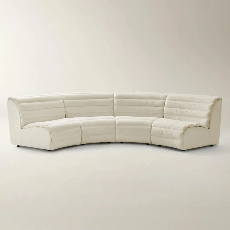 Arco 4 Seater Sofa with curved sectional design and soft beige upholstery for modern living rooms