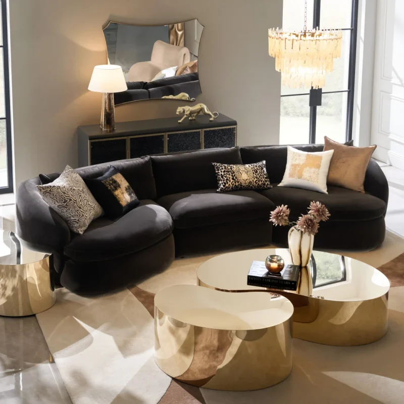 Veloura Arc 3 Seater Sofa in black velvet with curved sculptural base for modern interiors