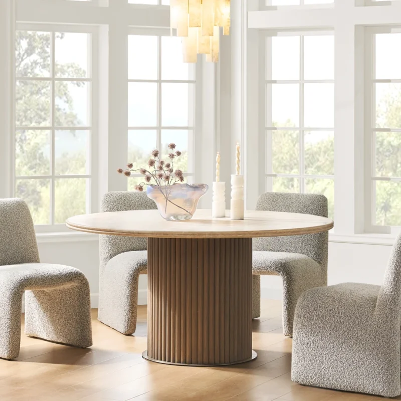 Strata Dining Table with a slatted cylindrical wooden base and round top for modern dining spaces